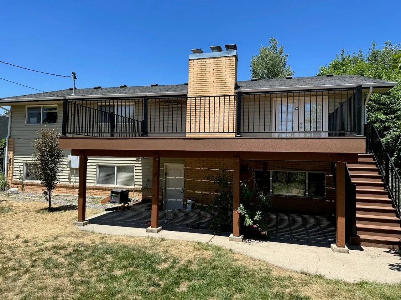 Elevated deck above a walkout patio