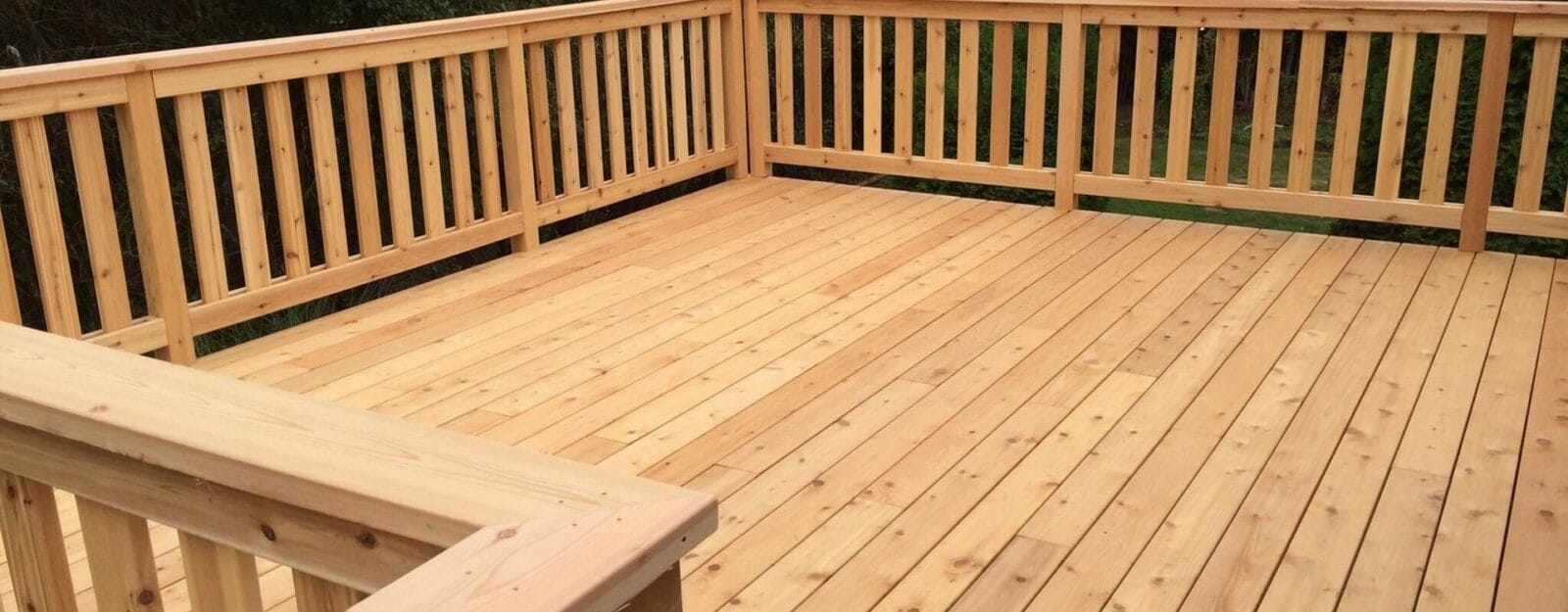 Finished custom wood deck with railing